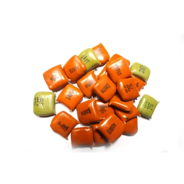 Конденсаторы КМ рыжие, группа Н90 М68, 1М0 — фото